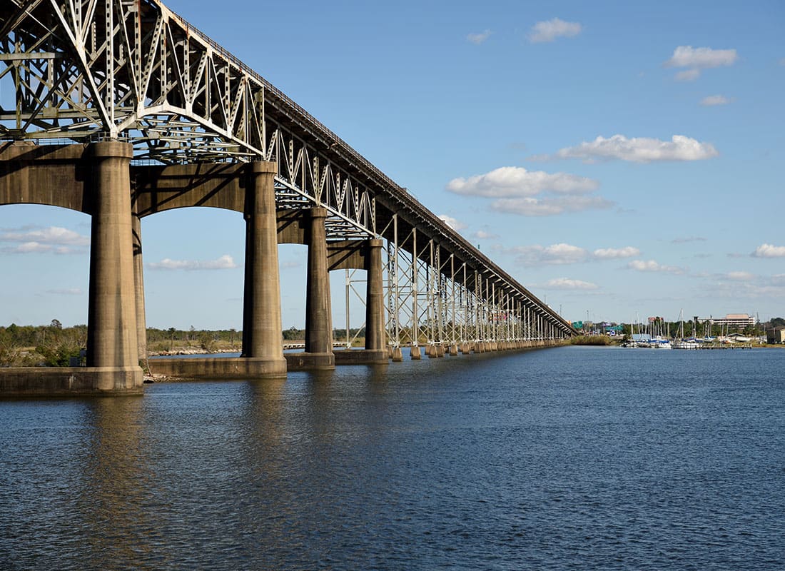 Westlake, OH - Scenic View of the Side of a Bridge Across the Water on a Sunny Day in Westlake Ohio